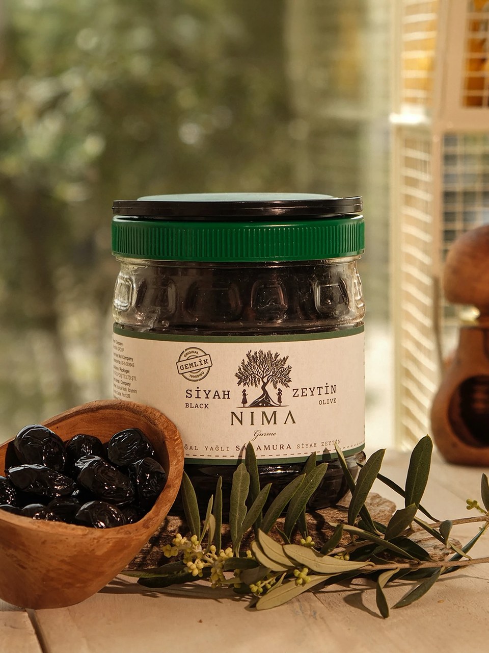 Nima Gurme şişe görseli 2