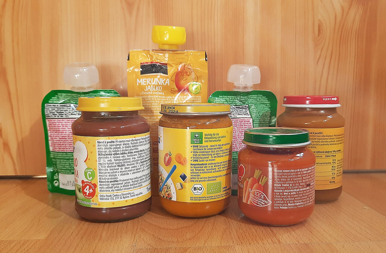 Storebought baby food - fruit and vegetable puree in glass and pouch