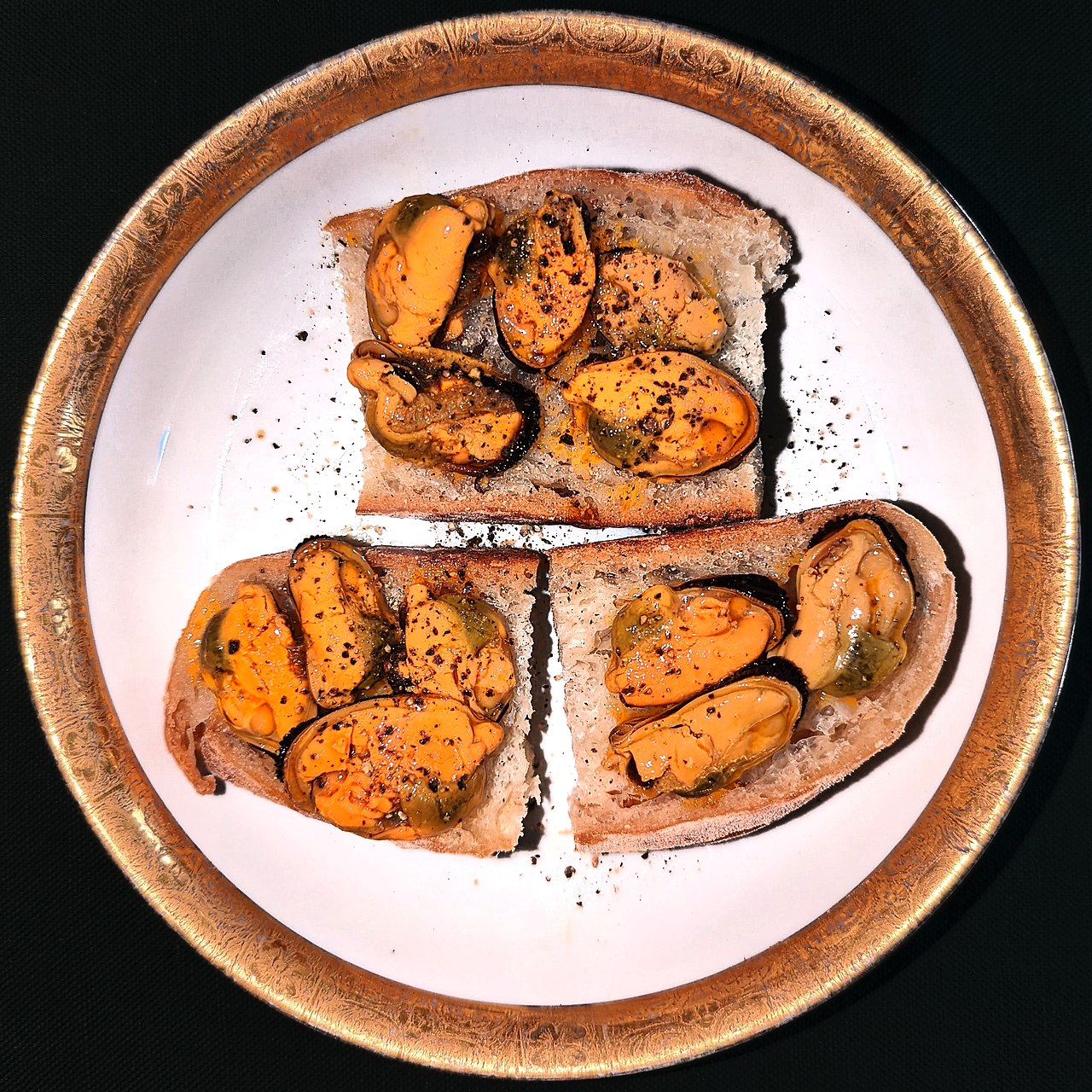 Mussels with olive oil, vinegar, and black pepper, on homemade bread - Massachusetts