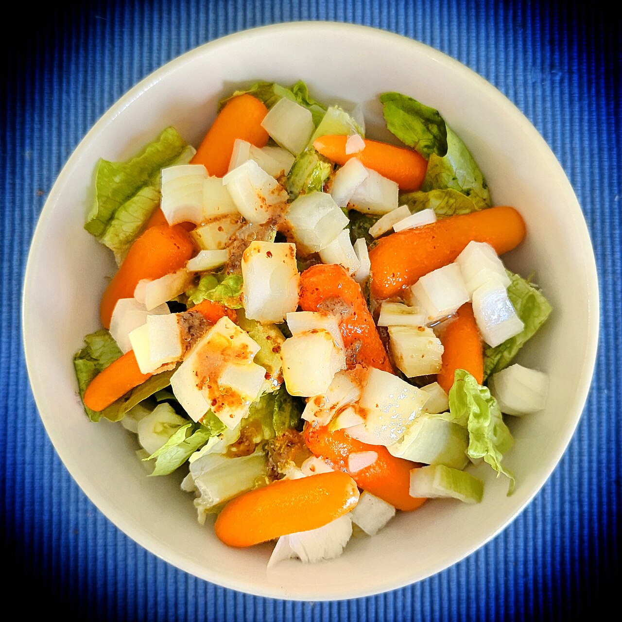 Salad of lettuce, baby carrots, and onions, with dressing of mustard, olive oil, and vinegar - Massachusetts
