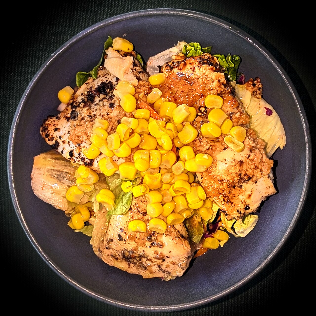 Chicken breast with chopped garlic and corn, on mixed salad with olive oil, vinegar, and black pepper - Massachusetts