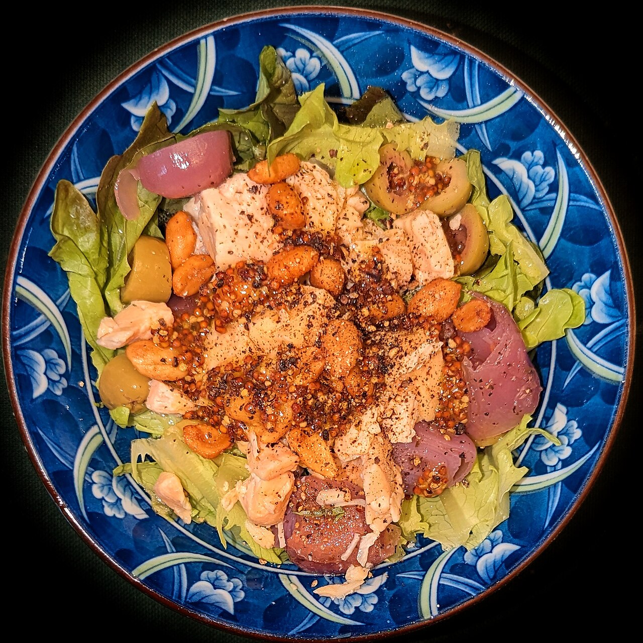 Salad of warm chicken on lettuce, with lampascioni, green olives, and peanuts, dressed in olive oil, mustard, and black pepper - Massachusetts